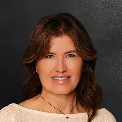 Naturopath Kelly Laishes Smiling In White Top